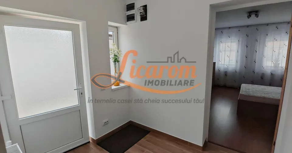 Casa 3 camere individuala Sanpetru,mobilata si utilata,128900 euro.