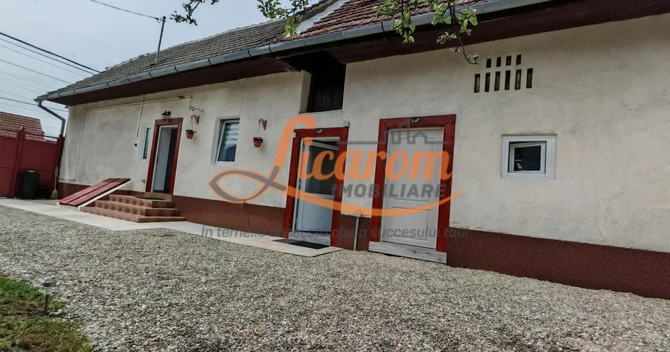 Casa 3 camere individuala Sanpetru,mobilata si utilata,128900 euro.